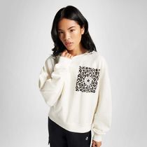 POLERA-MUJER-CONVERSE-LEOPARD-CNVHO23WCREW2-286_1